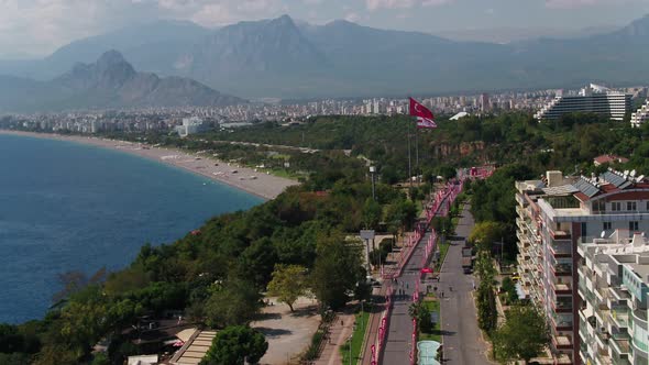 Antalya City And Beach With Turkey And Antalya Flags Aerial View