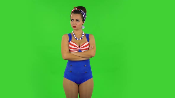 Beautiful Girl in a Swimsuit Is Very Offended and Looking Away Then Smiling. Green Screen