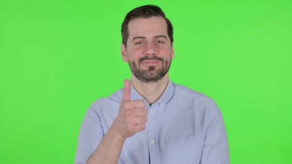 Portrait of Man Showing Thumbs Up Sign  Green Screen