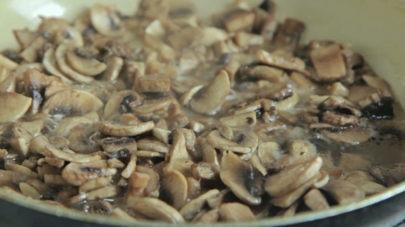 Grinded Mushrooms Roasting In Pan.