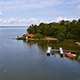 Aerial Footage of a Lake with Boat House - VideoHive Item for Sale