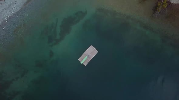 A raft looks lost in the water.