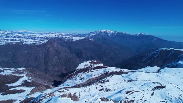 Panoramic view of Ski station centre resort at snowy Andes Mountains.