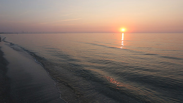 Sun Rising over Sea Horizon