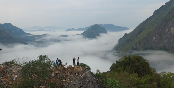 People On The Top Of Mountain Clouds