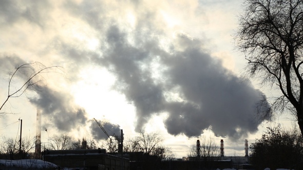 The Smoke Comes from the Chimneys in Winter