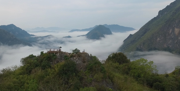 Aerial View People On The Top Of Mountain Clouds