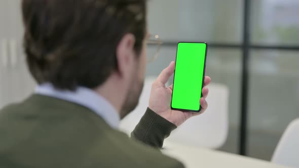 Businessman Using Smartphone with Chroma Screen