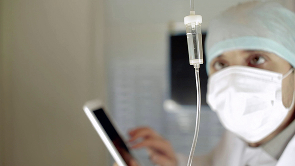 Doctor Using Tablet Pc