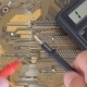 Man Measures Multimer Motherboard. - VideoHive Item for Sale