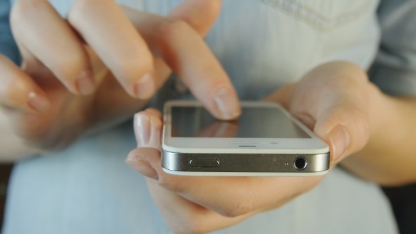 Young Woman Using Mobile Phone - Smartphone 