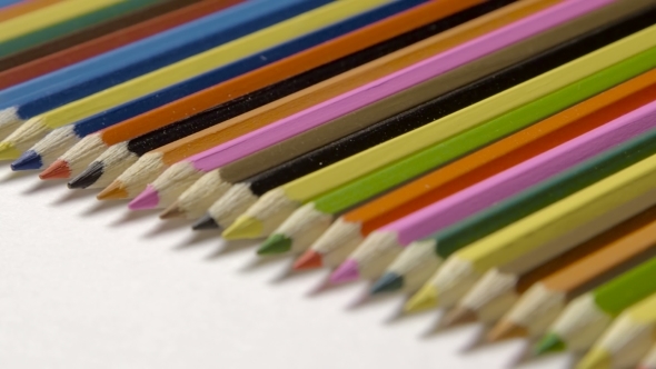 Line Of Colour Pencils Isolated On White Background 
