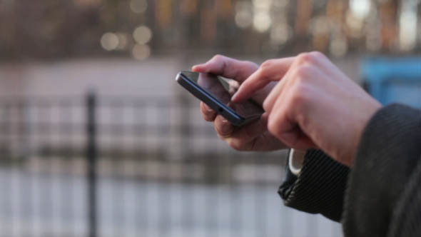 Man with a Touchscreen Phone  alt