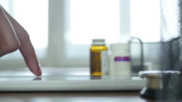 Doctor Typing On Tablet 28 alt