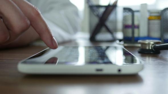 Doctor Typing On Tablet 30 alt