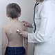 Doctor And Nurse Trying To Calm Down The Kid - VideoHive Item for Sale