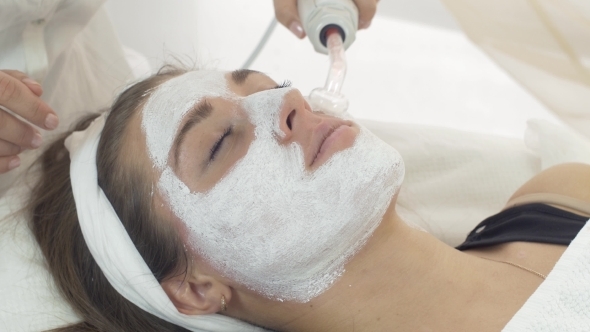  Darsonvalization Girl Face With Clay Mask In Saloon