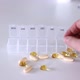Hand Put Pills to Medical Pill Box Tablet Doses for Daily Take Drugs Capsules - VideoHive Item for Sale