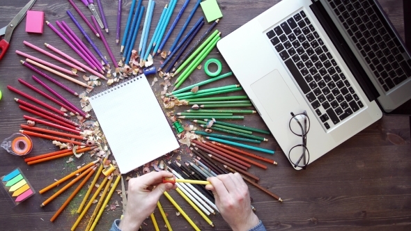 Workplace With Colored Pencils, Laptop, Palette On Wooden Table alt