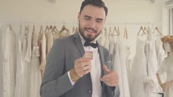 Funny Groom Man Wearing Wedding Clothes Dance in Dressing Room