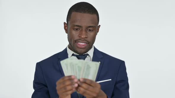 African Businessman Counting Dollars White Background