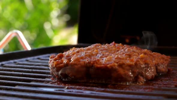 Tasty Thick Beef Cutlet Frying on the Grill