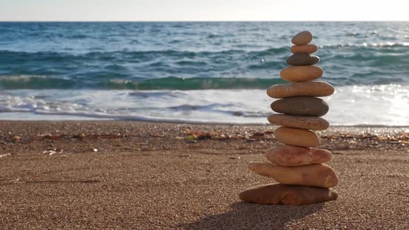Concept of Balance and Harmony - Stone Stacks on the Beach