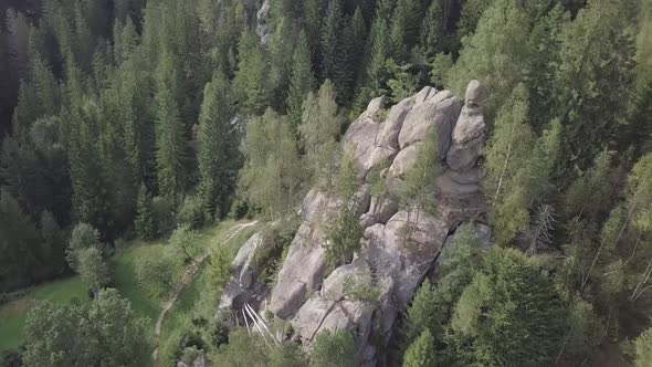 Stone rocks Ternoshorska Lada amidst beautiful scenic Carpathian forests, Ukraine