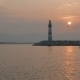 Boats Passing Lighthouse With Rising Sun - VideoHive Item for Sale