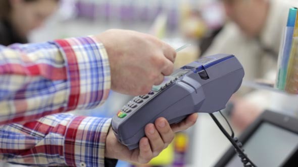 At the Supermarket, the Seller Enters a PIN Code
