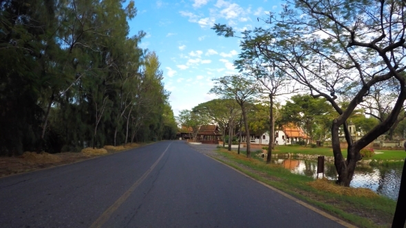 Riding Along The Country Road In Thailand