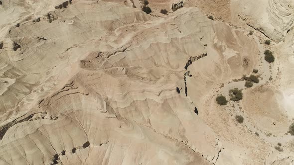 Arid hills seen from above alt