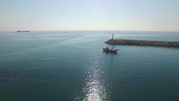 Sailing Yacht In The Harbor On Calm Sea