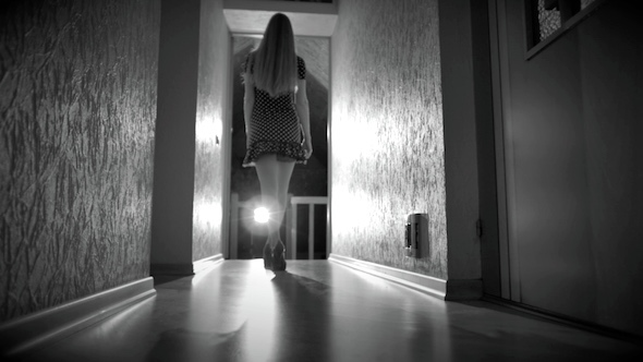 Girl Walks Down the Hall 1