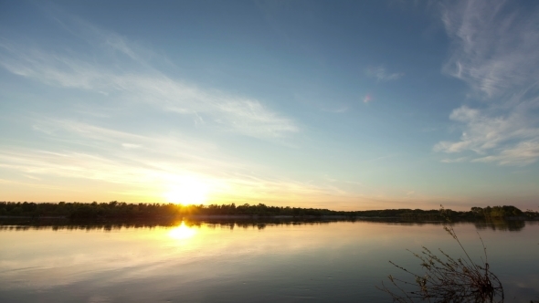 Lake With Reflection On The Water,  Of From Day To Nigh