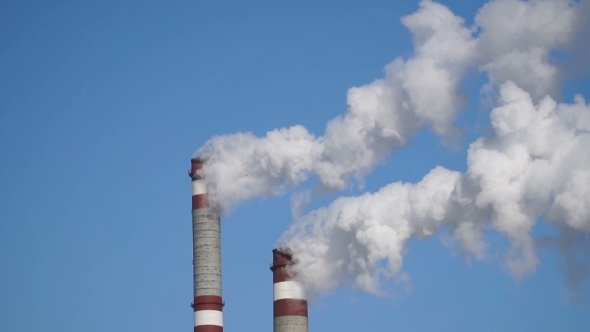 Industrial Chimneys Emits Toxic Pollutants Into The Sky Polluting The Environment