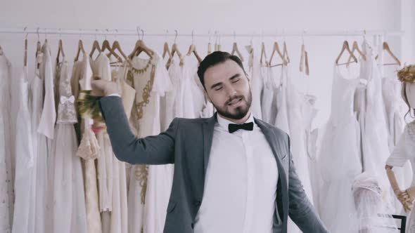 Funny Groom Man Wearing Wedding Clothes Dance in Dressing Room