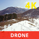Flying over Snowy Mountains in a Sunny Day - VideoHive Item for Sale