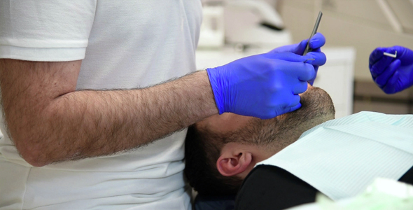 Man Patient On Dental Chair