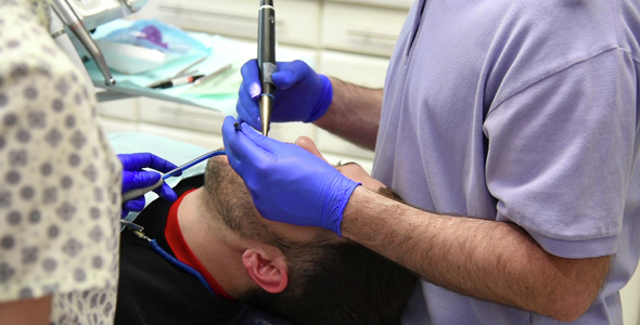 Dentist Checking Teeth