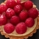 Unfinished To Eat Tartlet With Custard And Fresh Ripe Raspberries And Brush For Glazing Over Gray - VideoHive Item for Sale