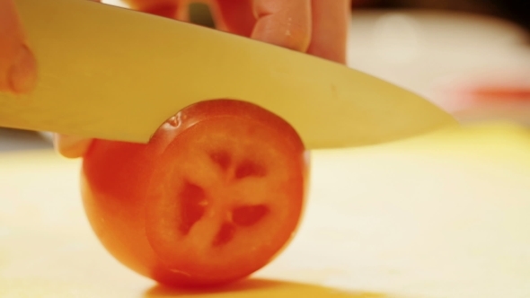 Cutting Vegetables In Kitchen.