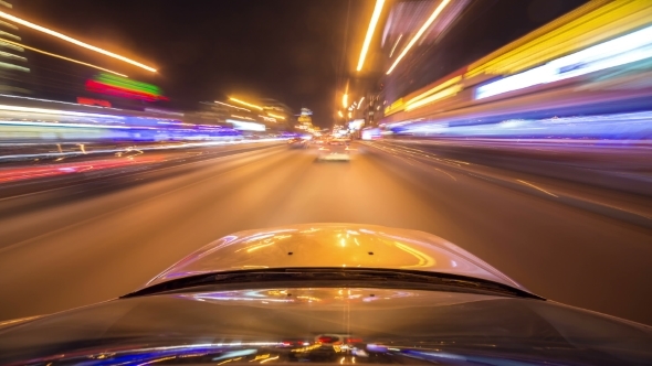 Night Driving At a Modern Highway Passing a Series Of Tunnels.