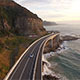 Aerial of Car on a Sea Cliff Bridge - VideoHive Item for Sale
