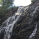 Big Beautiful Waterfall Flows Down The Rocks Mountains  - VideoHive Item for Sale