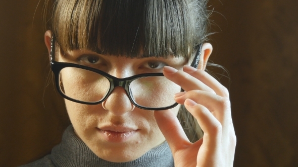 Portrait Young Serious Woman Wearing Glasses.