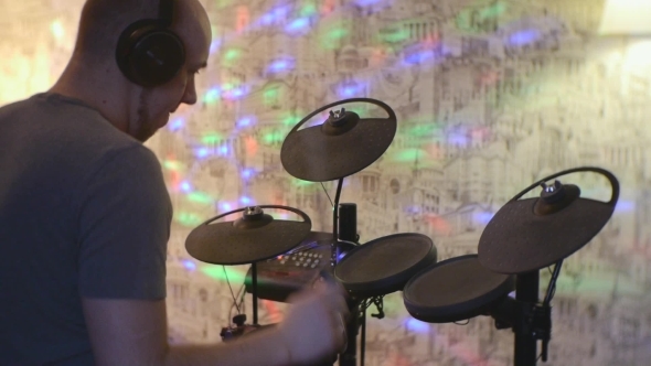 Man Playing At Electronic Drums 