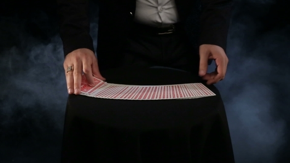 Croupier, A Magician Mixes The Cards In Different Ways 