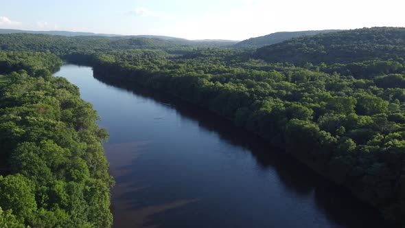 aerial view overlooking river and trees