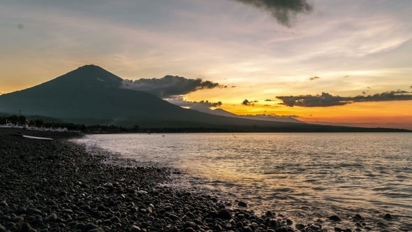 Sunset in Ocean And The Volcano Gunung Agung in Bali, Indonesia